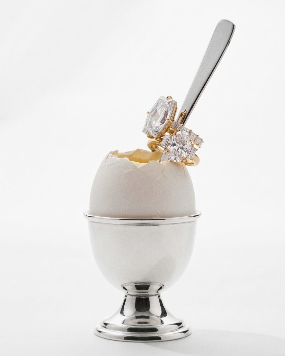 Rings on a spoon in an egg cup