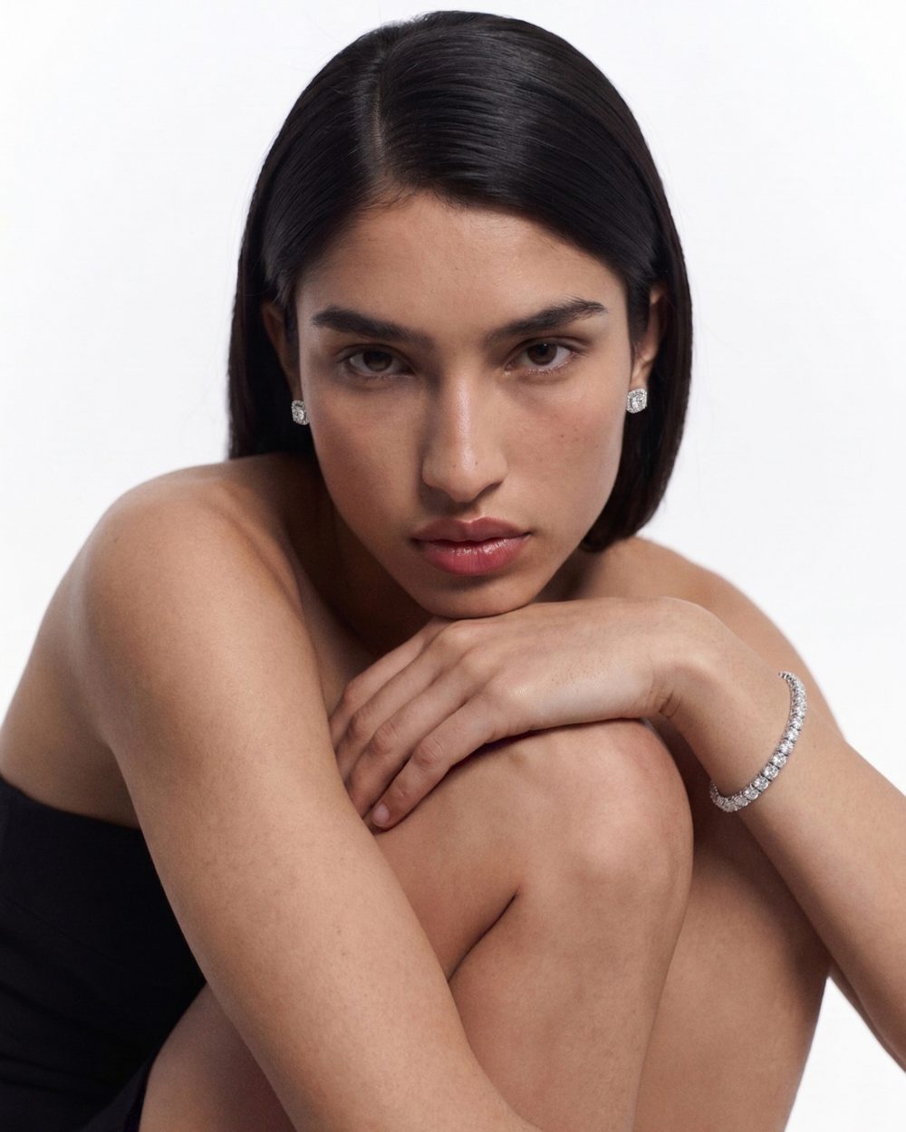 A model wearing a diamond bracelet