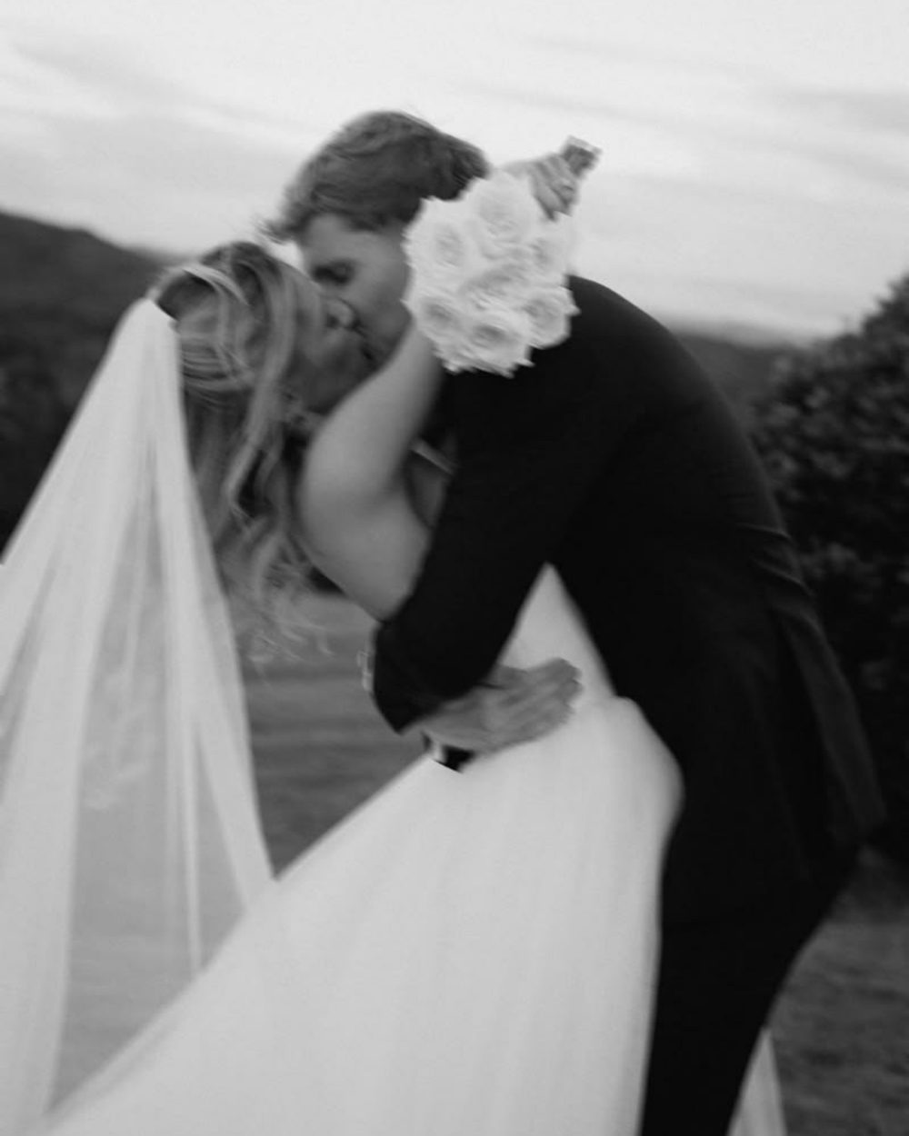 A couple embracing, black and white photograph